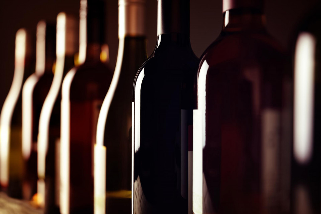 &lt;p&gt;Bottles of old aged wine collection in a row in winery cellar&lt;/p&gt;