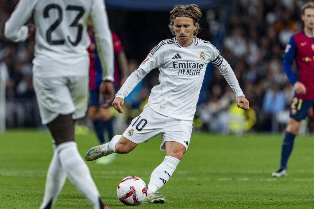 &lt;p&gt;Luka Modric of Real Madrid CF is in action with the ball during the La Liga EA Sports 2024/25 football match between Real Madrid CF and FC Barcelona at Estadio Santiago Bernabeu in Madrid, Spain, on October 26, 2024. (Photo by Alberto Gardin/NurPhoto) (Photo by Alberto Gardin/NurPhoto/NurPhoto via AFP)&lt;/p&gt;