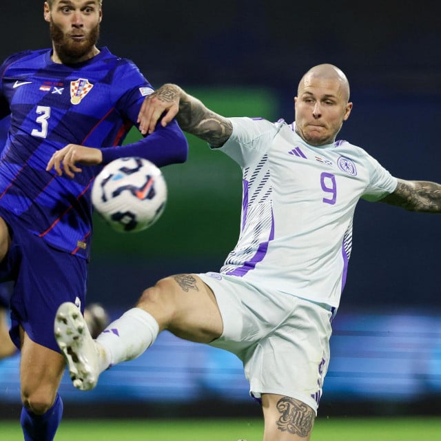 &lt;p&gt;Croatia‘s defender #03 Duje Caleta-Car fights for the ball with Scotland‘s forward #09 Lyndon Dykes during the UEFA Nations League, League A Group A1 football match between Croatia and Scotland at the Maksimir Stadium in Zagreb on October 12, 2024. (Photo by DAMIR SENCAR/AFP)&lt;/p&gt;