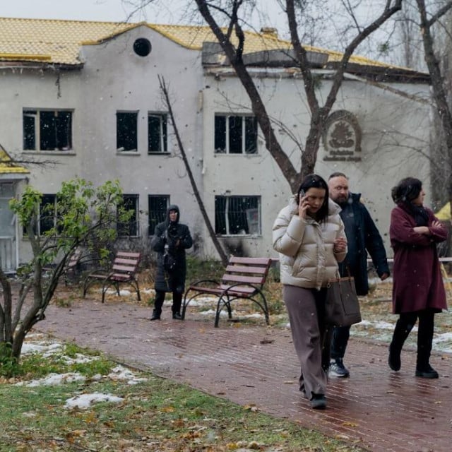 &lt;p&gt;People walk next to a damaged hospital building as a result of a Russian drone attack in Kyiv, on November 29, 2024, amid the Russian invasion of Ukraine. Russia launched more than a hundred drones at Ukraine overnight and early Friday, killing one person and wounding eight others, officials said. The nearly three-year war has seen a sharp escalation in recent days, with Moscow pummelling Ukraine‘s energy infrastructure ahead of the winter. Friday‘s drone barrage came a day after Russia launched around 90 missiles on the war-torn country, cutting power to over a million people. (Photo by Tetiana DZHAFAROVA/AFP)&lt;/p&gt;