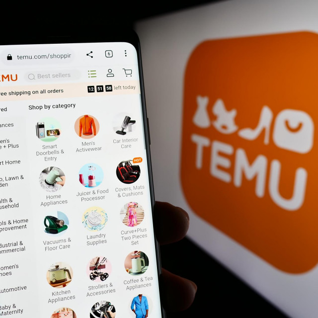 &lt;p&gt;Stuttgart, Germany - 03-17-2023Person holding cellphone with web page of American online shop company Temu on screen in front of logo. Focus on center of phone display. Unmodified photo.&lt;/p&gt;