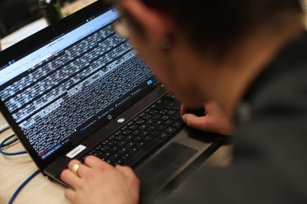 &lt;p&gt;(FILES) A student from an engineering school attends, on Meudon, west of Paris, overnight on March 16, 2013, the first edition of the Steria Hacking Challenge. The Grand Palais, which is hosting Olympic Games events in Paris, and around forty museums in France were the victims of a ransomware attack this weekend, police sources said on August 5, 2024. (Photo by THOMAS SAMSON/AFP)&lt;/p&gt;