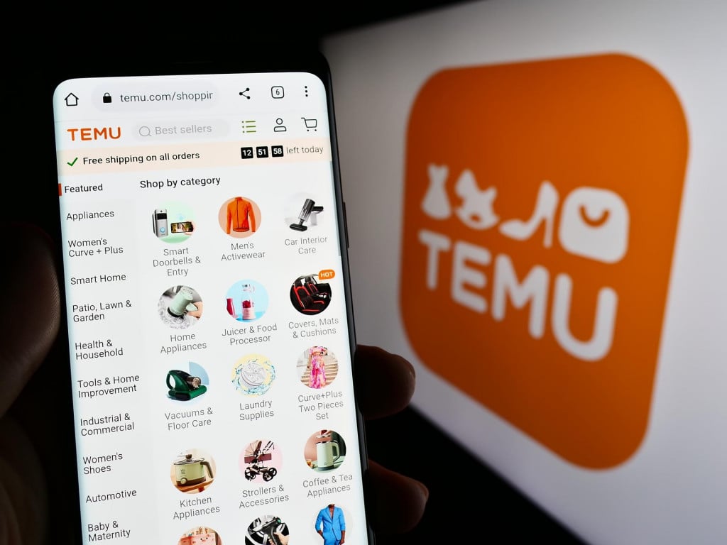 &lt;p&gt;Stuttgart, Germany - 03-17-2023Person holding cellphone with web page of American online shop company Temu on screen in front of logo. Focus on center of phone display. Unmodified photo.&lt;/p&gt;