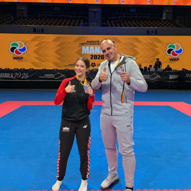 <p>Petra Babić s trenerom Ivanom Zoričićem</p>