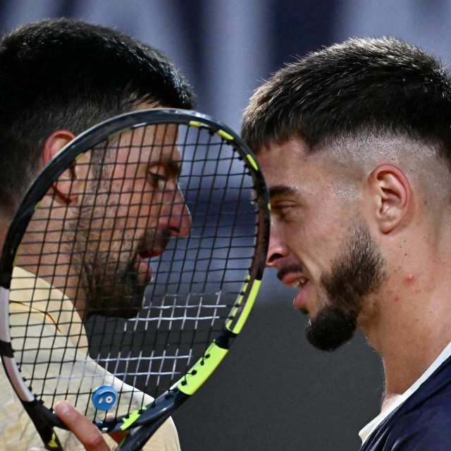 <p>Novak Đoković i Dino Prižmić</p>
