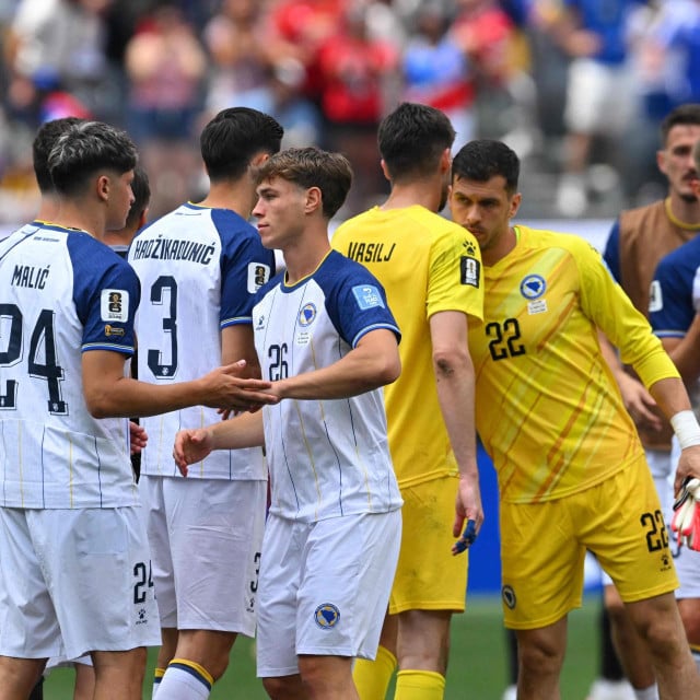 <p>Bosnia-Herzegovina&lsquo;s defender #24 Nidal Celik and midfielder #26 Ermin Mahmic react after losing the 2026 World Cup Group B football match between Switzerland and Bosnia and Herzegovina at Los Angeles Stadium in Inglewood on June 18, 2026. (Photo by Patrick T. Fallon/AFP)</p>
