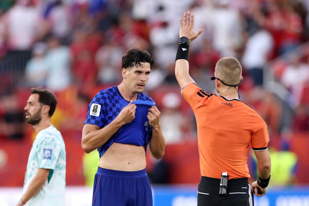 <p>TORONTO, ONTARIO - JULY 02: Igor Matanovic #20 of Croatia argues with referee Espen Eskas during the FIFA World Cup 2026 Round of 32 match between Portugal and Croatia at Toronto Stadium on July 02, 2026 in Toronto, Ontario. Justin Setterfield/Getty Images/AFP (Photo by Justin Setterfield/GETTY IMAGES NORTH AMERICA/Getty Images via AFP)</p>