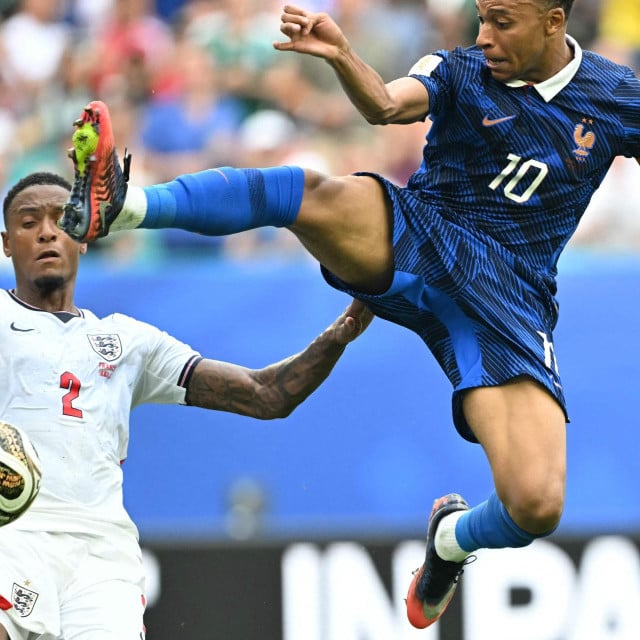 <p>TOPSHOT - England&lsquo;s defender #02 Ezri Konsa and France&lsquo;s forward #10 Kylian Mbappe fight for the ball during the 2026 World Cup football tournament third-place match between France and England at the Miami Stadium in Miami on July 18, 2026. (Photo by CHANDAN KHANNA/AFP)</p>