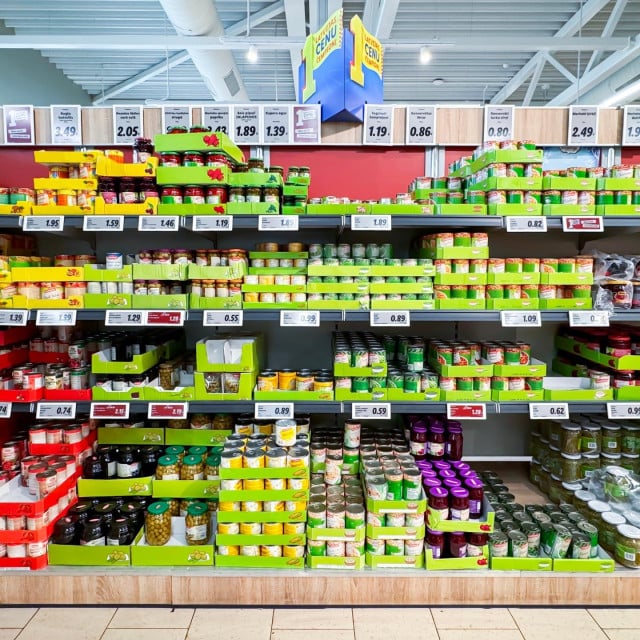 <p>LATVIA, RIGA, JULY, 25, 2024Canned olives, green peas, beans and other fruits and vegetables on shelves in Lidl supermarket store in Riga. Latvia</p>
