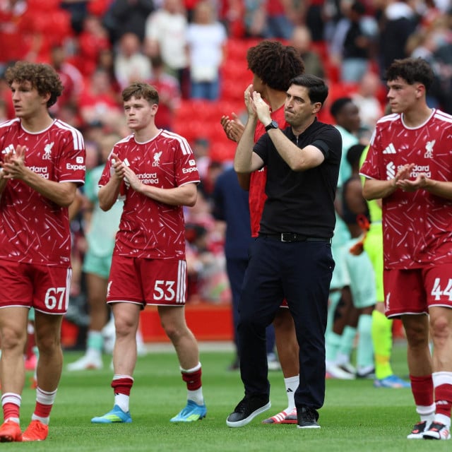 <p>Liverpool&lsquo;s Spanish head coach Andoni Iraola (C) and players applaud fans after the pre-season friendly football match between Liverpool and Monaco at Anfield in Liverpool, north west England on August 9, 2026. (Photo by Darren Staples/AFP)</p>