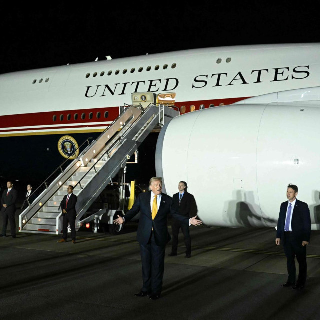 <p>(FILES) US President Donald Trump gestures in front of Air Force One after disembarking from the older VC-25A Air Force One at Royal Air Force (RAF) Mildenhall in Mildenhall, eastern England on July 8, 2026, before continuing his journey to the United States while returning from a NATO summit in Turkey. US President Donald Trump secretly flew out of Turkey last month on a smaller plane than previously known due to an assassination threat from Iran, the Washington Post reported late August 10, 2026. According to an anonymous US official who spoke to the Post, Trump boarded an Air Force One jet in Ankara on July 8, but then moved into a catering container attached to the plane. The container then ferried him to a smaller C-32A aircraft that flew him to Britain, while media and some officials were led to believe Trump was still on the bigger jet. (Photo by SAUL LOEB/AFP)</p>