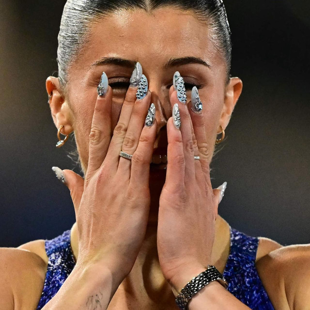 <p>TOPSHOT - Gold medallist Britain&lsquo;s Amy Hunt celebrates after winning in the women&lsquo;s 200m final during the European Athletics Championships at Alexander Stadium in Birmingham on August 13, 2026. (Photo by Ben STANSALL/AFP)</p>