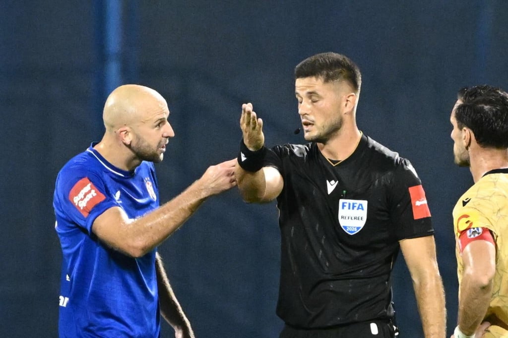<p>Patrik Kolarić u raspravi s Josipom Mi&scaron;ićem</p>