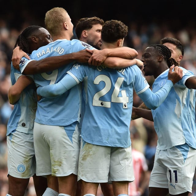 <p>Manchester City&lsquo;s Norwegian striker #09 Erling Haaland (2L) celebrates with teammates after scoring their fifth goal during the English Premier League football match between Manchester City and Sunderland at the Etihad Stadium in Manchester, north west England, on September 20, 2026. (Photo by PETER POWELL/AFP)/RESTRICTED TO EDITORIAL USE. No use with unauthorized audio, video, data, fixture lists, club/league logos or &lsquo;live&lsquo; services. Online in-match use limited to 120 images. An additional 40 images may be used in extra time. No video emulation. Social media in-match use limited to 120 images. An additional 40 images may be used in extra time. No use in betting publications, games or single club/league/player publications./</p>