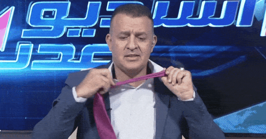 <p>Voditelj na lokalnoj televiziji u Adenu skida kravatu</p>
